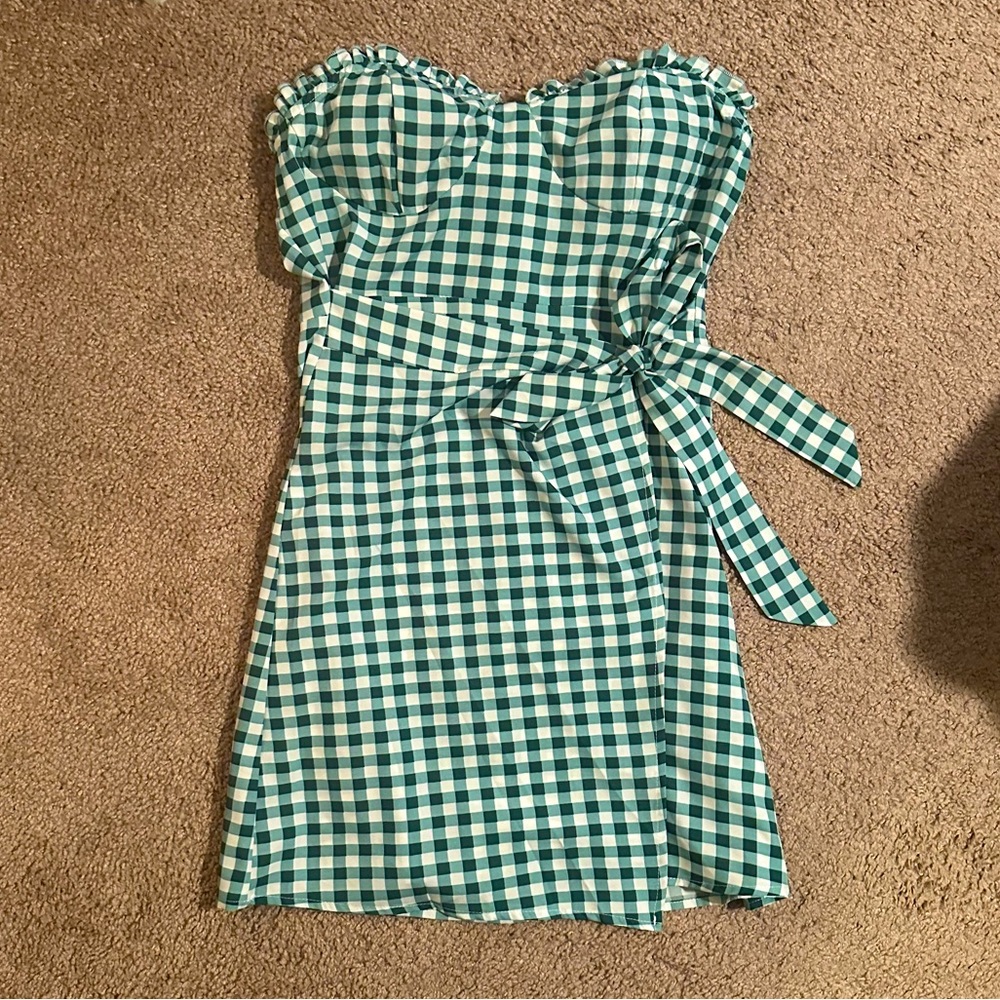 Green gingham mini dress, strapless with sweetheart neckline.